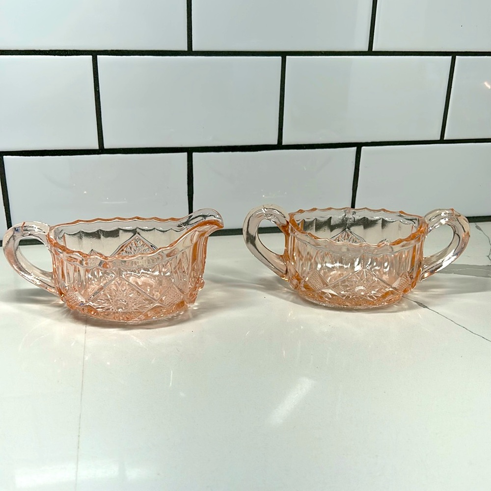 Pink depression, glass sugar and creamer set